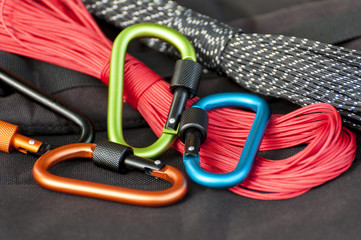 Metal carabine for mountaineering. Photo of colored carabines.