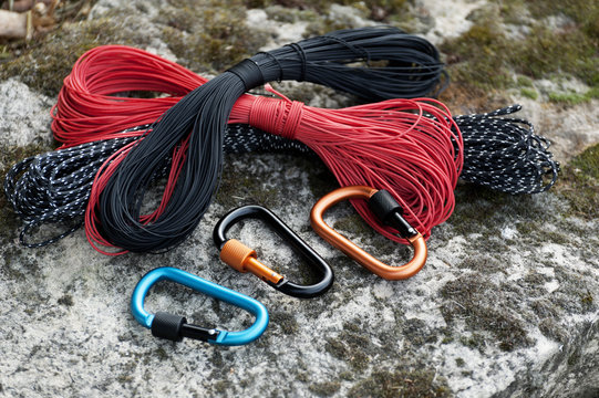 Metal carabine for mountaineering. Photo of colored carabines.
