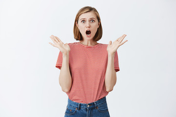 Girl went to shop and someone stole her bike, feeling shocked and upset, gesturing with spread...