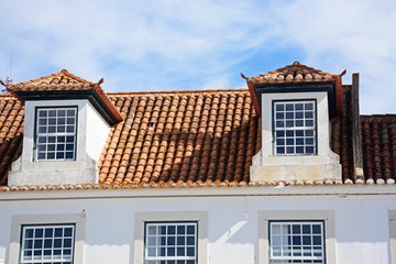 Traditional Portuguese building with dormer windows in the Praca do Marques de Pombal (Marquis of Pombal Square), Vila Real de Santo Antonio, Algarve, Portugal.