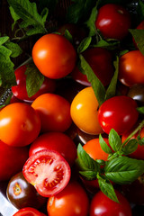 various types of tomatoes served and presented on the silver platter.
