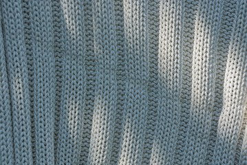 gray fabric background made from a piece of crumpled cloth