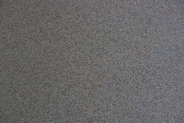 brown gray dark stone texture of a piece of marble in the wall