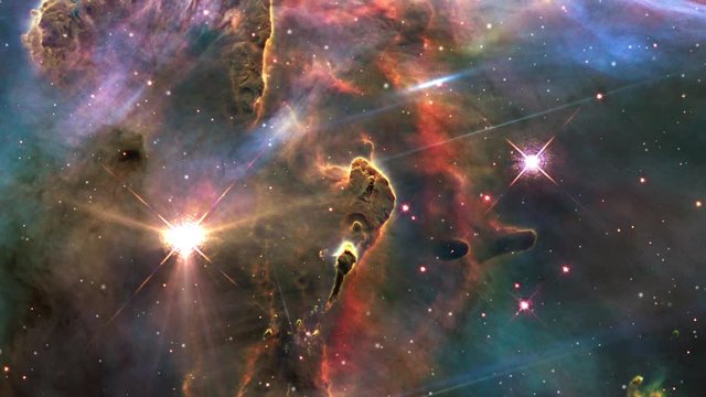 Carina nebula mystic mountain animation with pillar jet and burst flare light. Contains public domain image by NASA