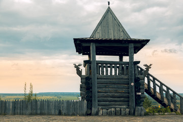 A close-up of the observation tower with a spire and a wooden staircase