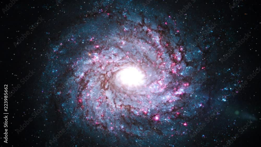 Wall mural spiral galaxy rotating in outer space on star field flare light at center. contains public domain im