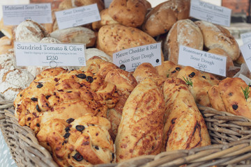 A variety of fresh bread for sale at local farmers market