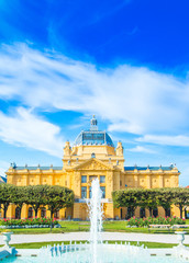     Zagreb, Croatia, art pavilion and beautiful flowers in park in summer day, colorful 19 century architecture 