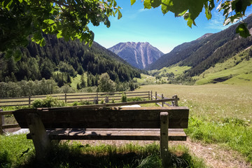 Looking at the Binntal (Valais, Switzerland). The valley is drained by the Binna, a tributary of the Rhone. The valley is named after Binn, the main settlement. The mountains exceed 3,000 meters 