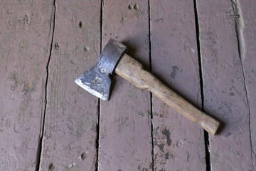 The axe on the wooden floor