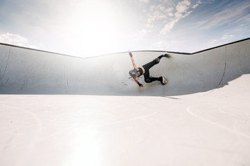 Woman practicing figure skating in skatepark. Madrid Spain. © OscarStock
