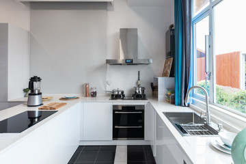 Fototapeta na wymiar New modern kitchen interior