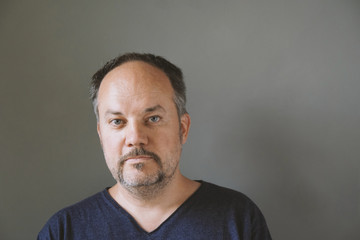 middle aged forty-something man with mustache beard