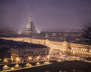 Fototapeta na wymiar Piazza Vittorio Veneto in Turin, Italy, at night with Mole Antonelliana in the back