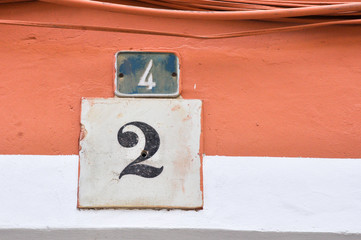 adress number of the orange house, four and two