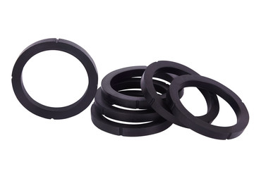 Set of black gaskets isolaled on white background. Oil seals for hydraulic cylinders for Industrial on white background. Oil Seals chemical resistant for Industrial