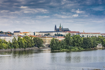 view of castle and charles bridge in prague