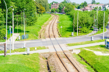 Crossing of the road and railway, equipped with a barrier