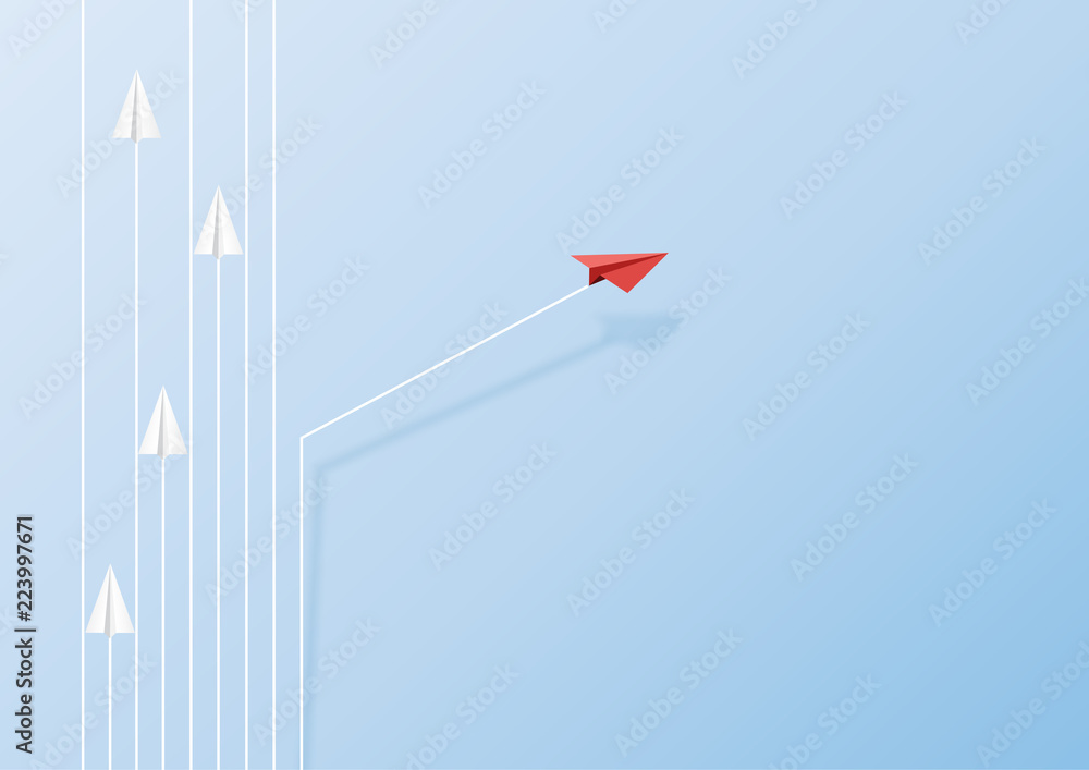 Wall mural paper airplanes flying on blue sky and cloud.paper art style of business teamwork and one different 