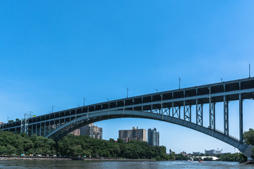 Fototapeta na wymiar Henry Hudson Bridge over the Harlem River, Manhattan