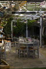 restaurant with wooden tables and chairs , restaurant with good moods.