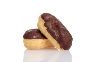 two chocolate eclairs on white