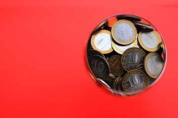 Russian money, 10 ruble coins accumulated and stacked in one heap, riches or poverty