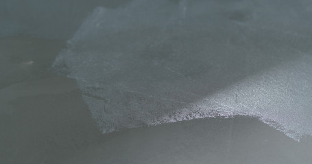 closeup applying protective coating on the concrete floor