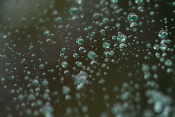 Closeup rain drops on glass with hydrophobic coating