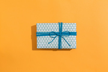 A gift box on a orange background