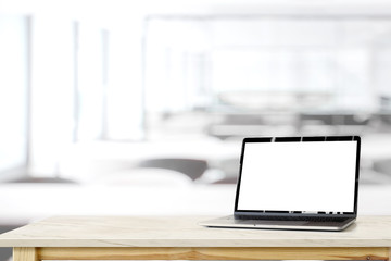 Workspace mockup blank screen laptop on marble desk table.