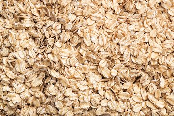 Oat flakes. Pattern of oat flakes. Hercules as background..