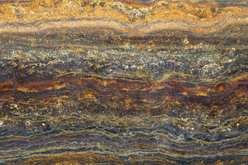 Beautiful rusty colorful background structure for wallpaper. Looks like a semi-precious stone or natural decoration. 
