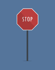 Stop street sign with shadow on the sign and on the bottom on a blue background