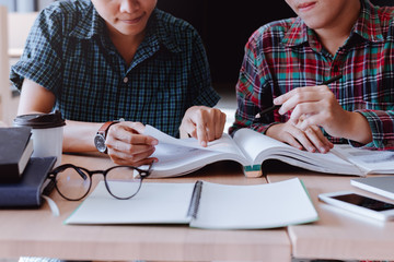 Students studying in the classroom during the lecture.
