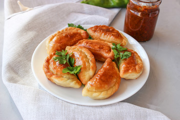 Fried dumplings with stuffing.