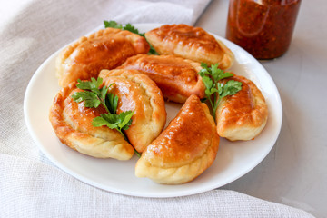 Fried dumplings with stuffing.