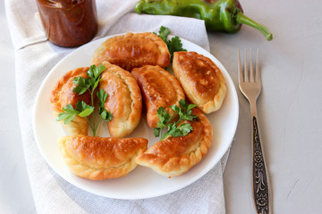 Fried dumplings with stuffing.