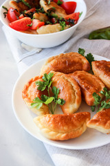 Fried dumplings with stuffing.