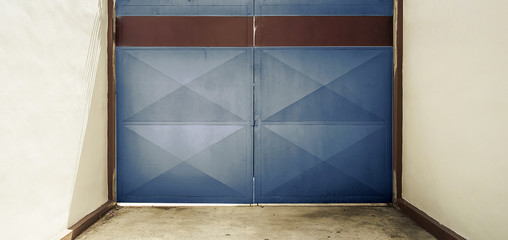 Blue door with warehouse closeup photo stock