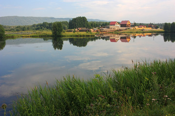 Houses on the shore of a pond