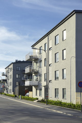 Fototapeta na wymiar Modern apartment buildings with blue sky
