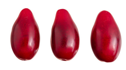 Red berries of cornel or dogwood isolated on white background. Top view. Flat lay