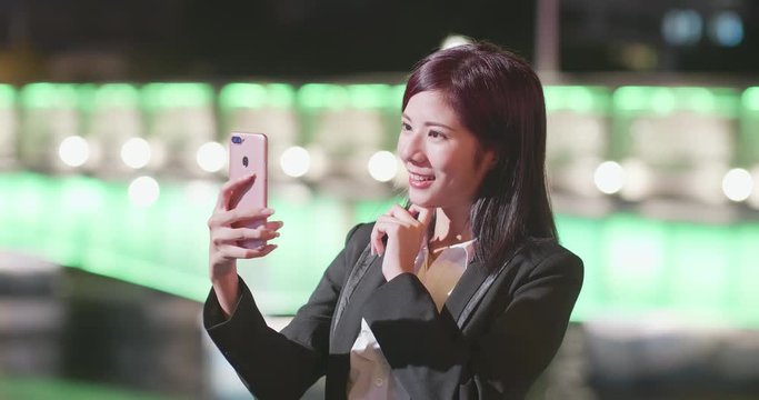 woman selfie happily in city