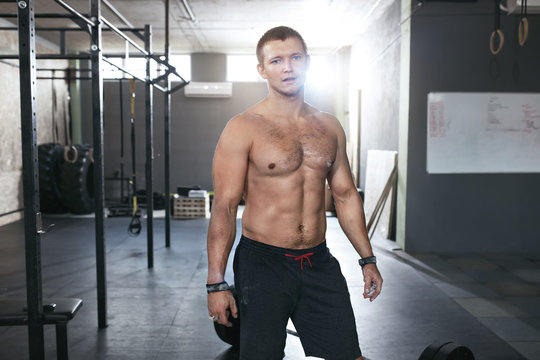 Portrait Of Sports Man At Workout Gym