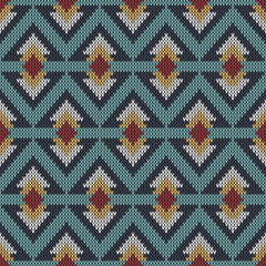 Geometric abstract knitted pattern. Abstract ethnic seamless pattern. Design for sweater, scarf, comforter or clothes texture.