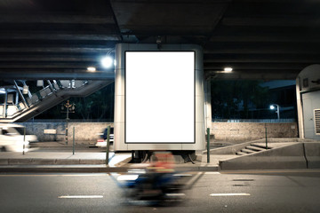 Blank Poster display advertisment on street.Empty poster under Overpass and Night light traffic.