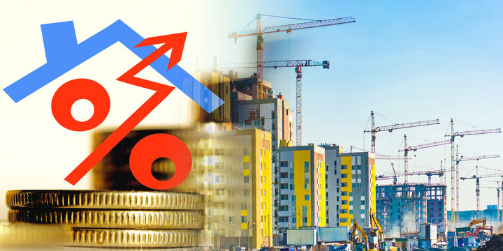 The symbol of interest on the background of the construction of a new residential area . The concept of increasing the growth of construction .