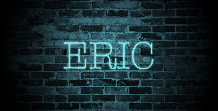first name Eric in blue neon on brick wall