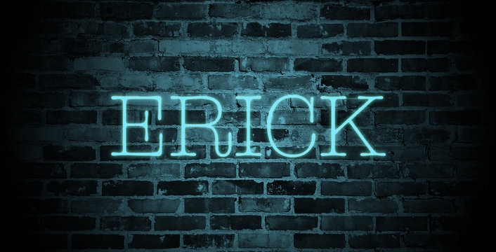 first name Erick in blue neon on brick wall